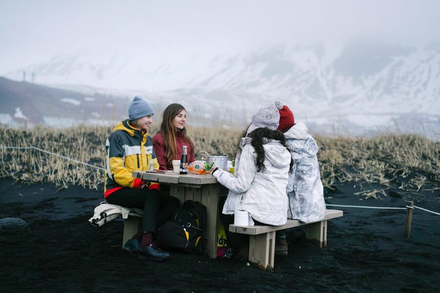 Friends gathered in Iceland's winter mountains
