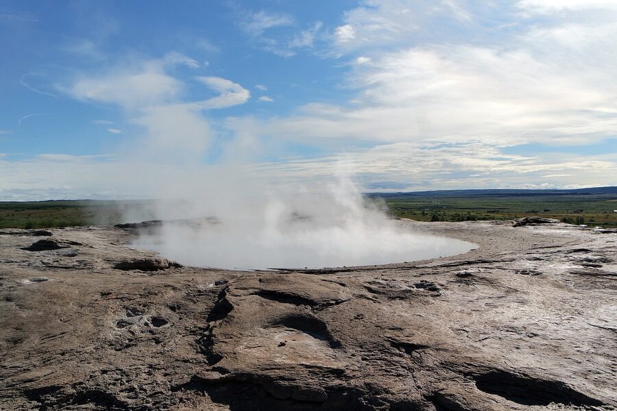 Strokkur geyser erupting at Geysir geothermal area Iceland