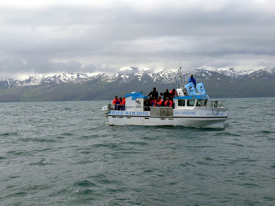Small whale watching boat at Husavik harbour Iceland