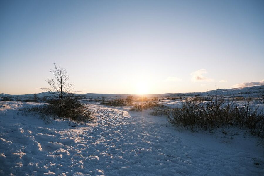 Iceland winter sunset over snowy hills