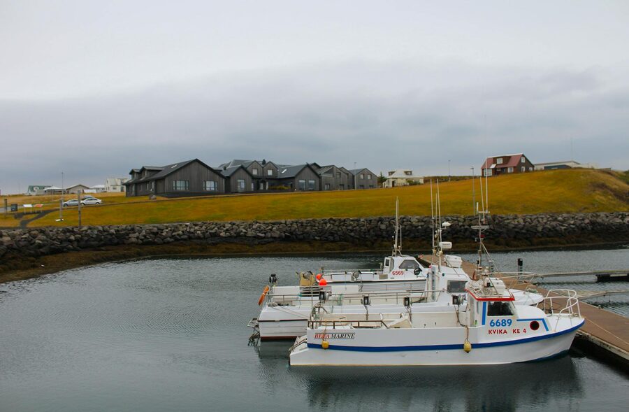 Small fishing harbour with boats moored