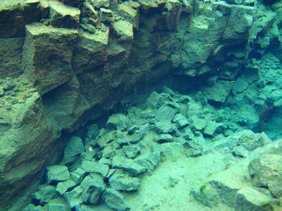 Divers preparing at the Silfra fissure entry point in Iceland
