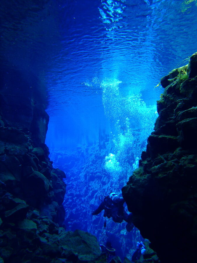 A scuba diver in the Silfra fissure in Iceland