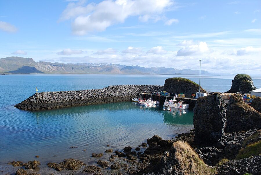 The small harbour at Arnarstapi with sea cliffs on the Snaefellsnes peninsula