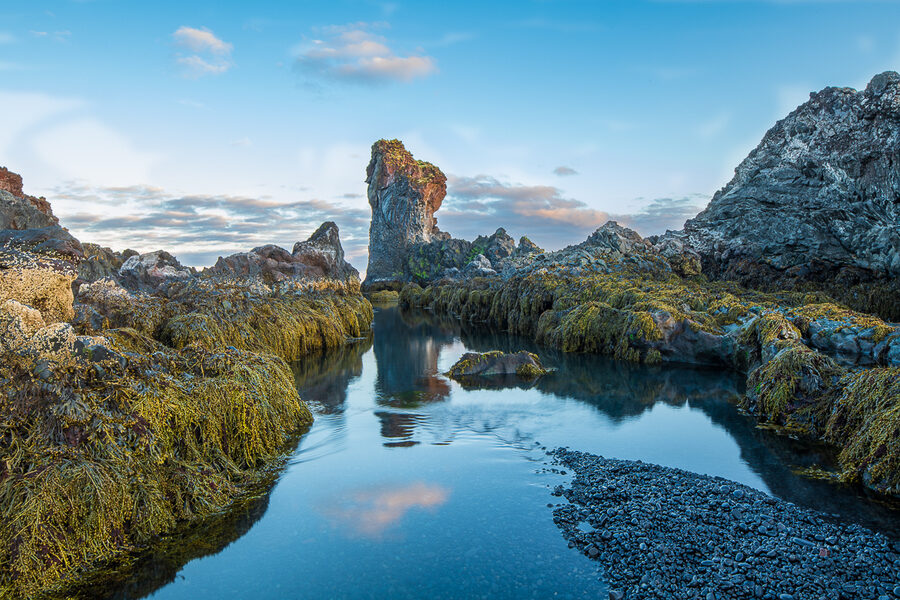 Djupalonssandur black pebble beach with shipwreck remains in the Snaefellsjokull National Park