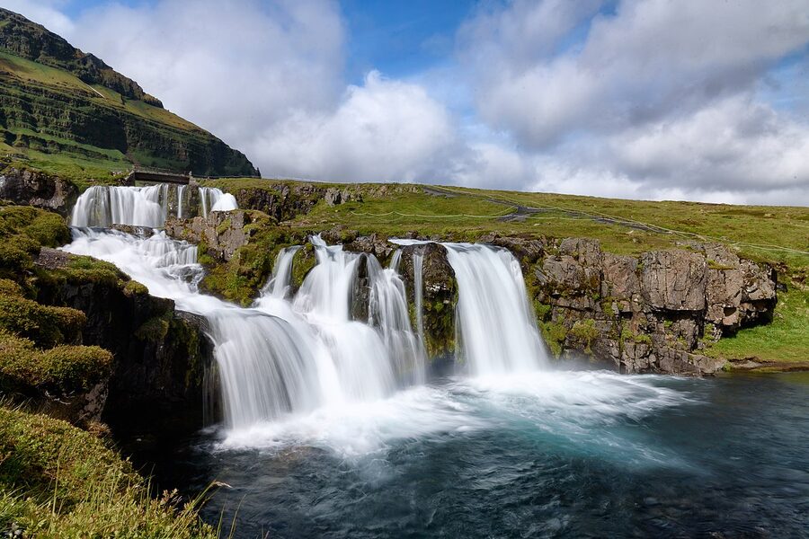 Kirkjufellsfoss waterfall in the foreground with Kirkjufell mountain behind