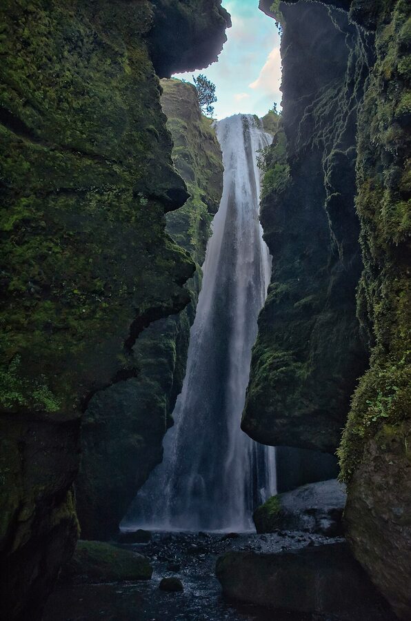 Inside the Gljufrabui canyon waterfall chamber