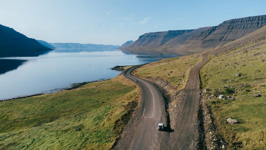 Aerial view of a winding road along Iceland Westfjords coastline