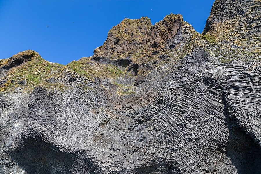 Basalt formation called the Organ on the cliffs of Heimaey