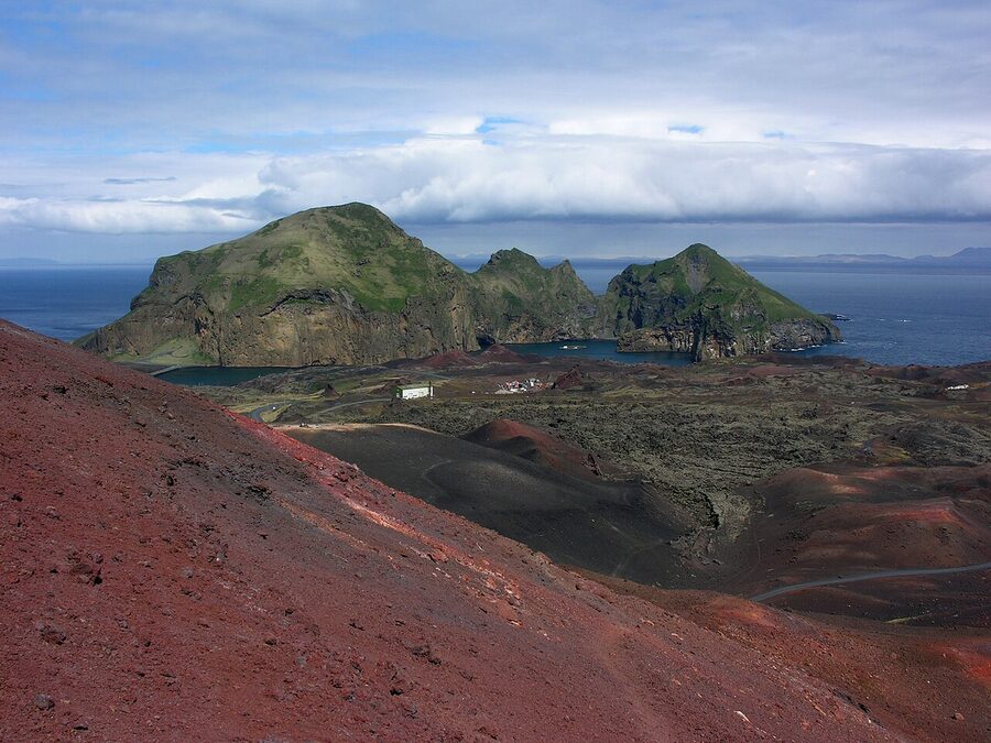 Heimaklettur cliff and basalt face above Heimaey harbour