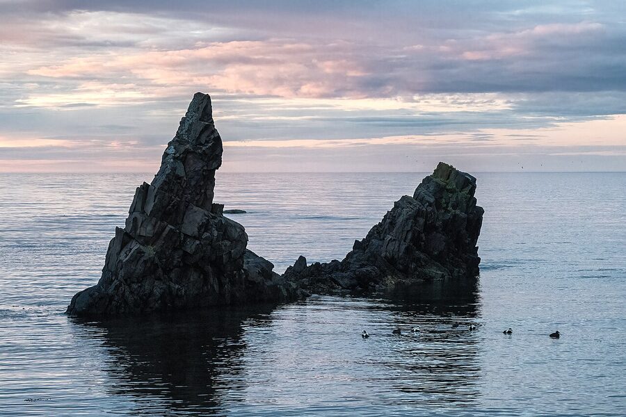 Midnight sun lighting up the coast of Iceland in summer