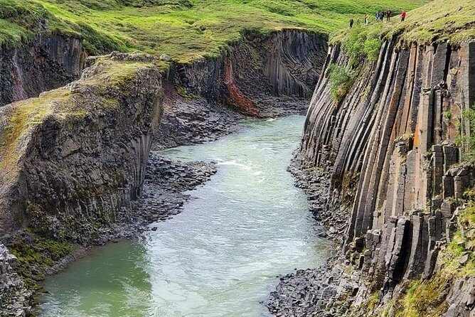 4, 5, 6 or 7-Day Small-Group Ring Road Tour from Reykjavik - Day 1: Seljalandsfoss, black sand beaches, and Solheimajokull glacier ice