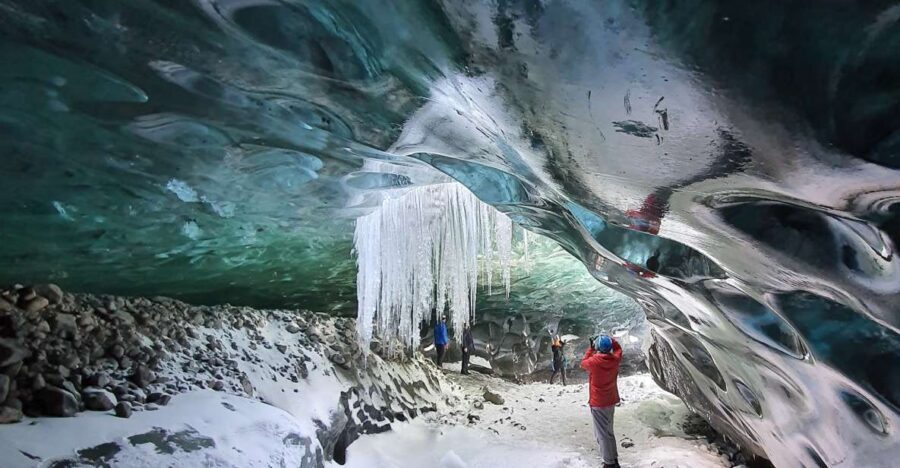 From Reykjavik 2-Day South Coast Tour with Blue Ice Cave - Reynisfjara’s black sand: stunning, striking, and not a place to stroll casually