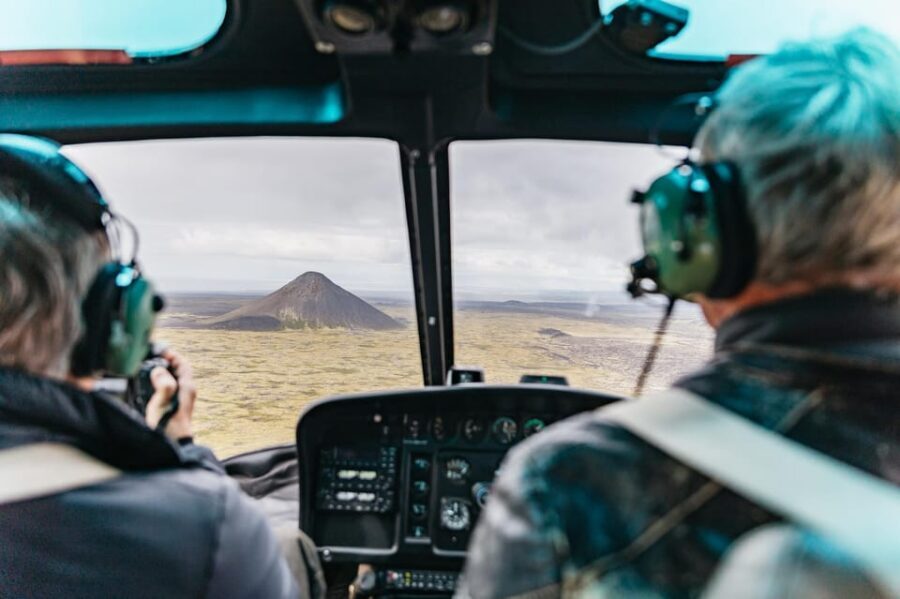 From Reykjavik: New Volcanic Area Helicopter Tour - Back toward Reykjavík: how the air turns into a gallery