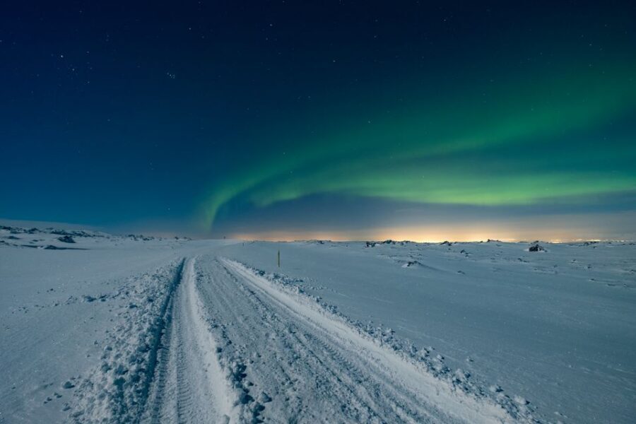 From Reykjavik: Northern Lights Tour with Lifetime Guarantee - What happens at the guided secret stop