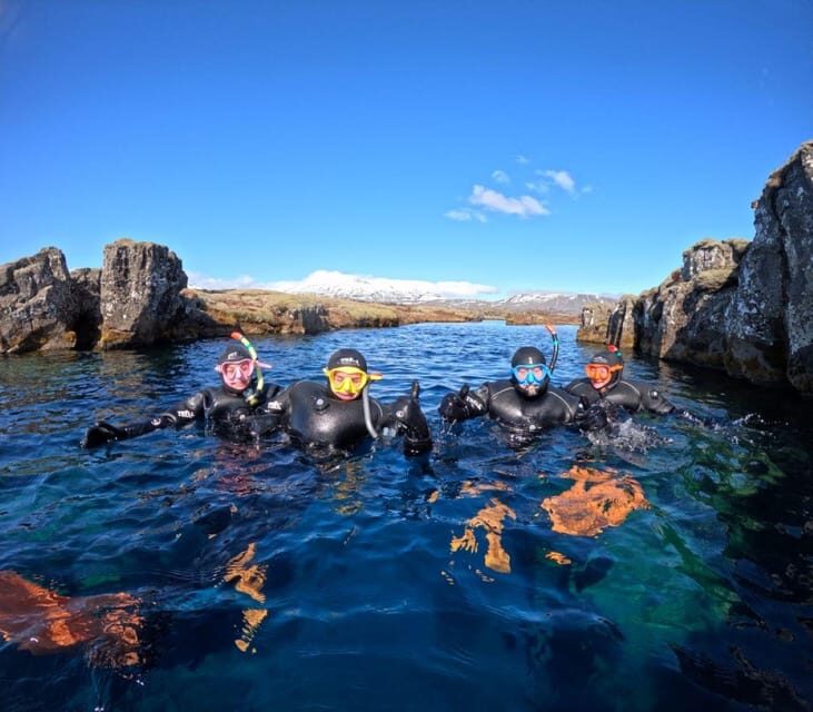 From Reykjavik: Silfra Snorkeling with Free Photos - From water to photos: how guides like Edgar and Wilmar help you get the shots
