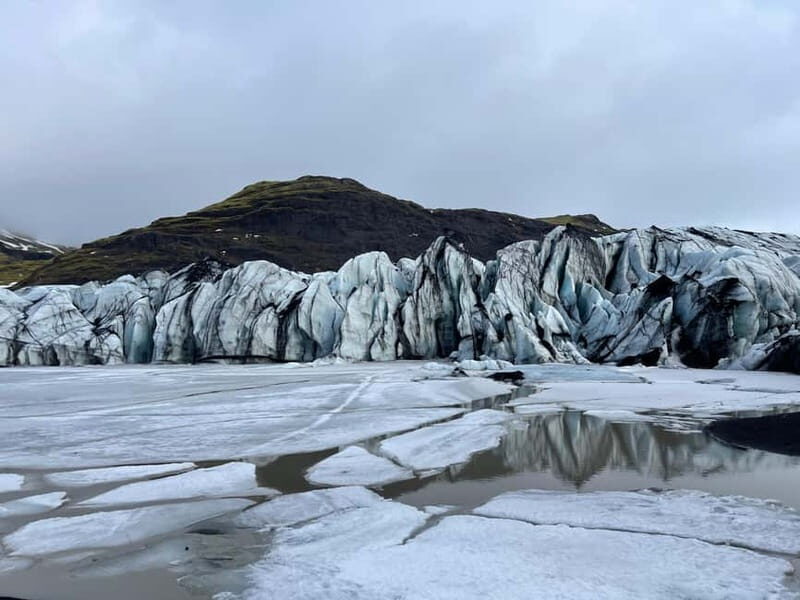 From Reykjavík: South Coast Highlights Day Tour - Reynisfjara black sand and Reynisdrangar sea stacks