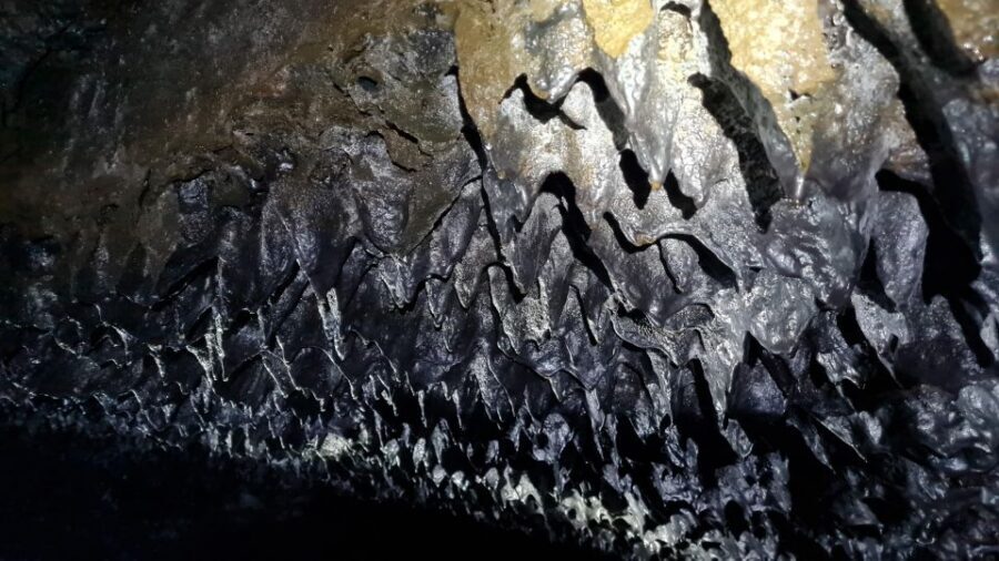 Geological Lava Tunnel Adventure - Arnarker Cave - A geologist guide turns dark stone into a clear story