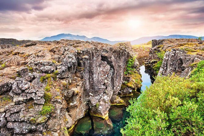 Golden Circle, Bruarfoss & Kerid Crater by Minibus from Reykjavik - Bruarfoss waterfall: blue water, moss, and slippery footing