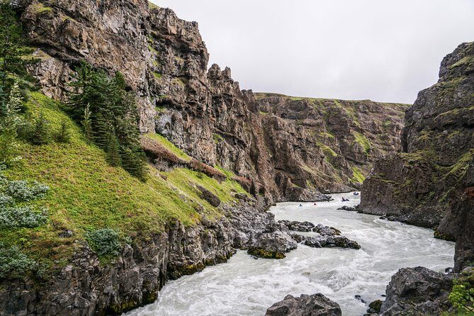 Iceland’s Top Grade 4 Rafting – Drysuit, Canyon & Adrenaline - Safety kayakers and guide skills that keep the day fun