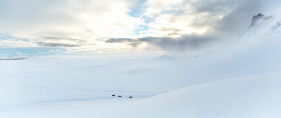 Into the Glacier: Snowmobile + Langjökull Ice Tunnel Combo - Walking into the ice tunnel: layers, ash, and why this feels different than a cave