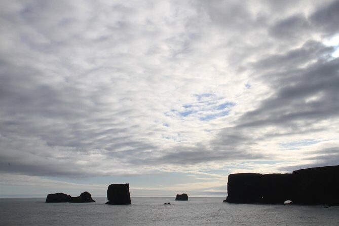 Private Day Trip to the Icelandic South Coast from Reykjavik - Dyrhólaey: Bird cliffs, two roads, and views that change by direction