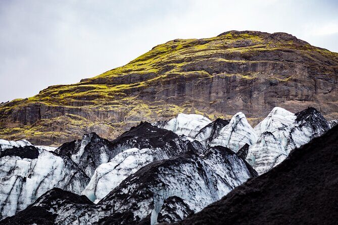 Private South Coast Fire and Ice: Glacier viewpoint & Lava Show - Vik town break: lunch options and coastal wandering