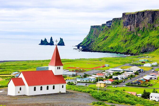Private South Coast Tour with Katla Ice Cave - Stop 5: Reynisfjara Beach and the basalt wall of black sand