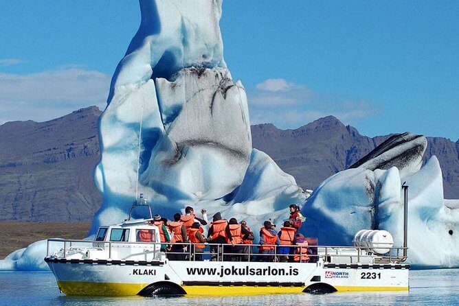 Reykjavik: Glacier Lagoon Boat Ride & South Coast Full Day Tour - Diamond Beach: black sand and floating ice that looks unreal