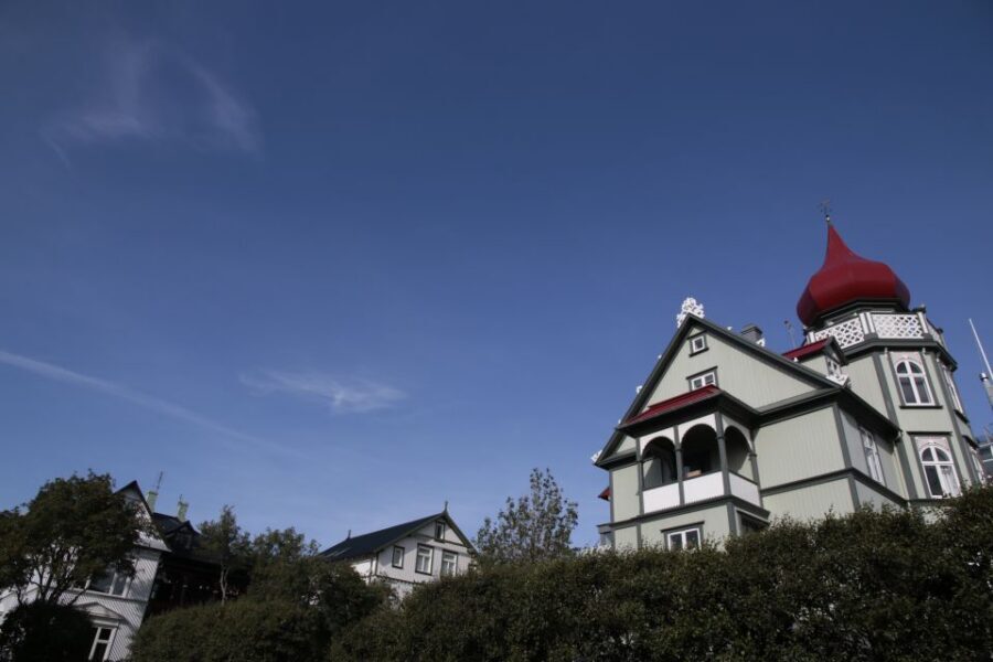 Reykjavik: Guided City Walking Tour - Down through the old center: Parliament, the pond, and narrow lanes