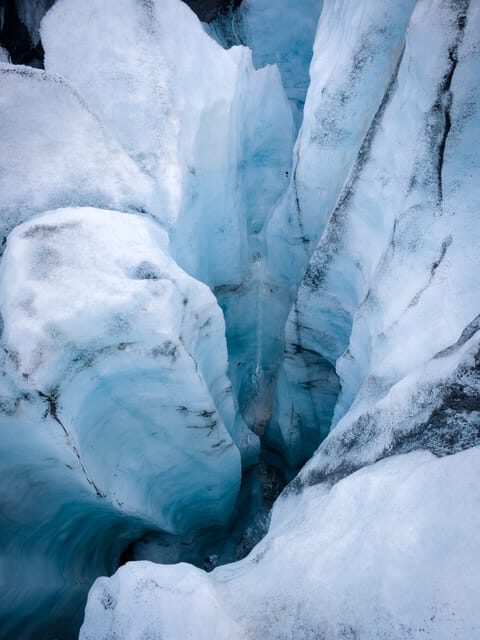 Reykjavík: Iconic Glacier Hike, South Coast & Waterfalls - Skógafoss: the 60-meter waterfall that can turn mist into rainbows