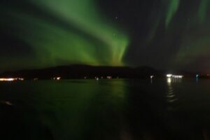 Reykjavik: Northern Lights Guided Boat Tour - Getting ready: overalls, shoes, and your best shot at clear photos