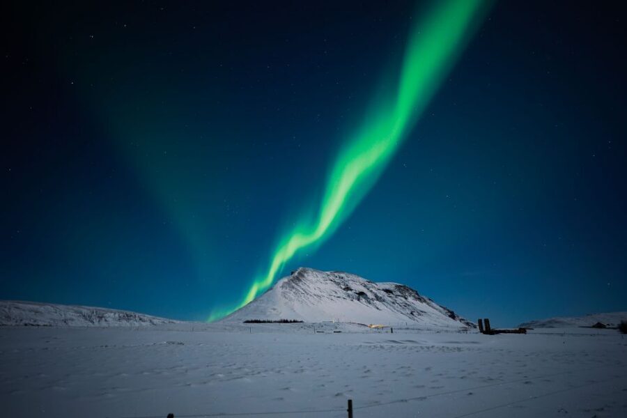 Reykjavik: Northern Lights Tour with Private Photographer - Weather reality and the re-run promise