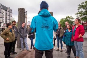 Reykjavik Walking Tour - Walk with a Viking - Ingólfstorg pillars and Aðalstræti: the downtown warm-up that makes the rest click