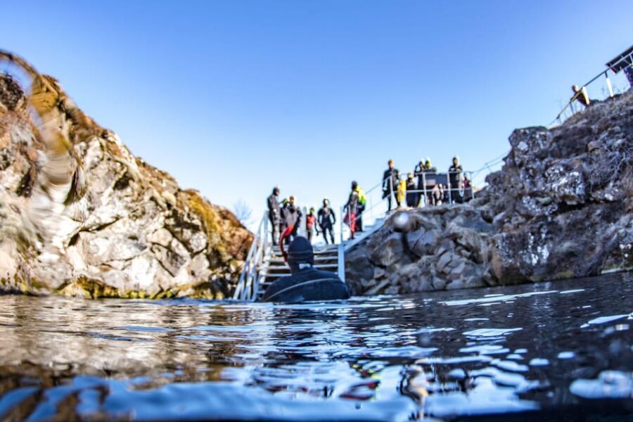 Silfra: Snorkeling Tour Between Tectonic Plates - Gear-up routine: drysuits, heated van, and suit fit