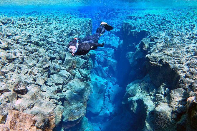 Silfra Wetsuit Snorkeling - Meet on Location | Free Photos - Safety and English coaching: the stuff that keeps the day fun