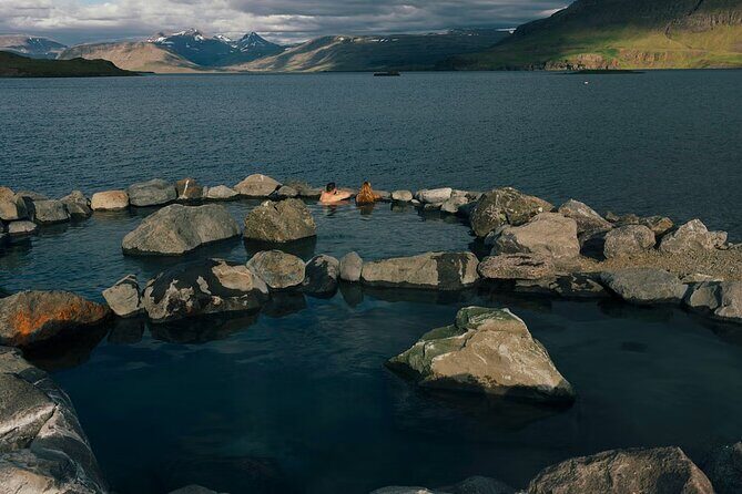 Small-Group Golden Circle, Hvammsvík Spa with Ticket & Crater - Kerið crater: moss, iron colors, and a turquoise lake in 30 minutes