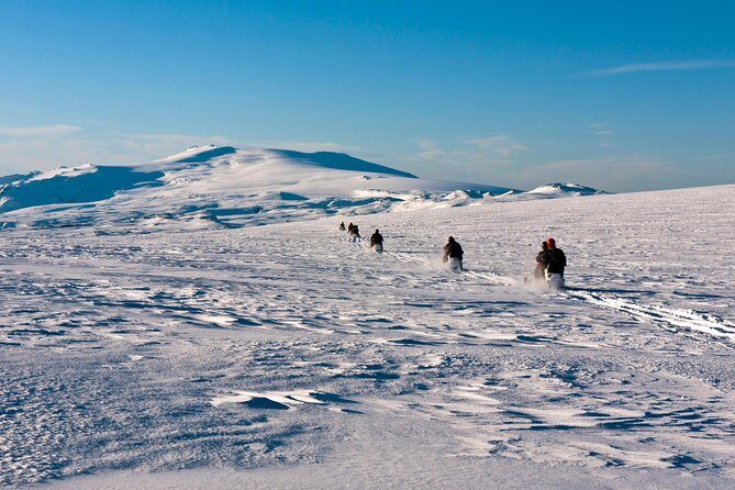 South Coast and Glacier Snowmobiling Day Trip from Reykjavik - Skógafoss first: classic waterfall energy and a quick walk option