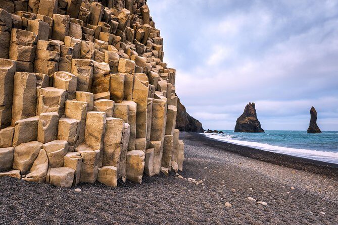 South Coast Iceland from Reykjavik with Guide & Touchscreen Audio - Reynisfjara Black Sand Beach: Basalt, Sea Stacks, and Rogue-Wave Reality