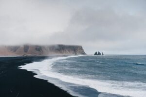 South Coast, Waterfalls and Black Sand Beach (Small Group Tour) - Stop 1: Skogafoss and the Chest-Behind-the-Falls Story